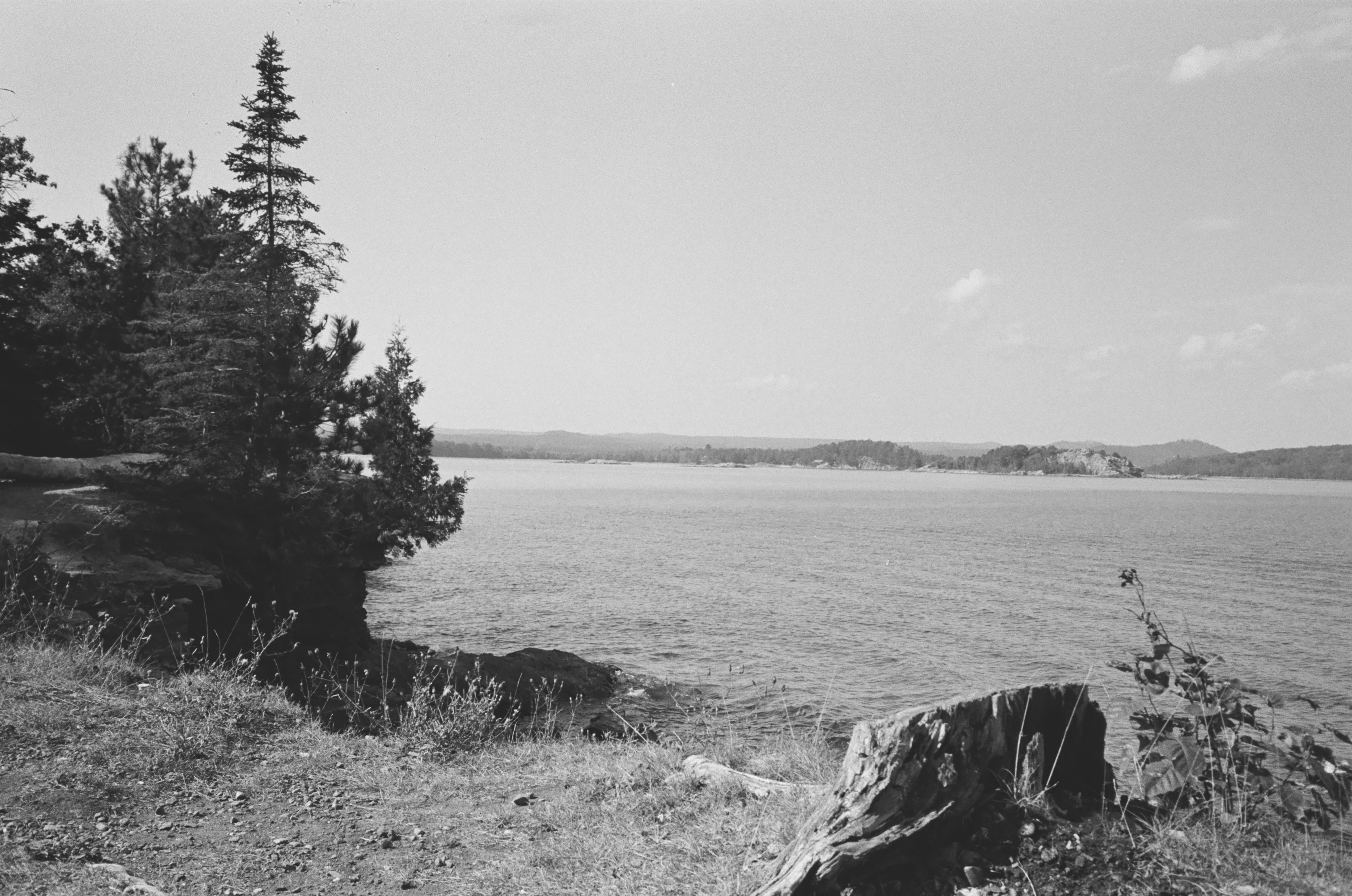 an image of a shore line shot on black and white film